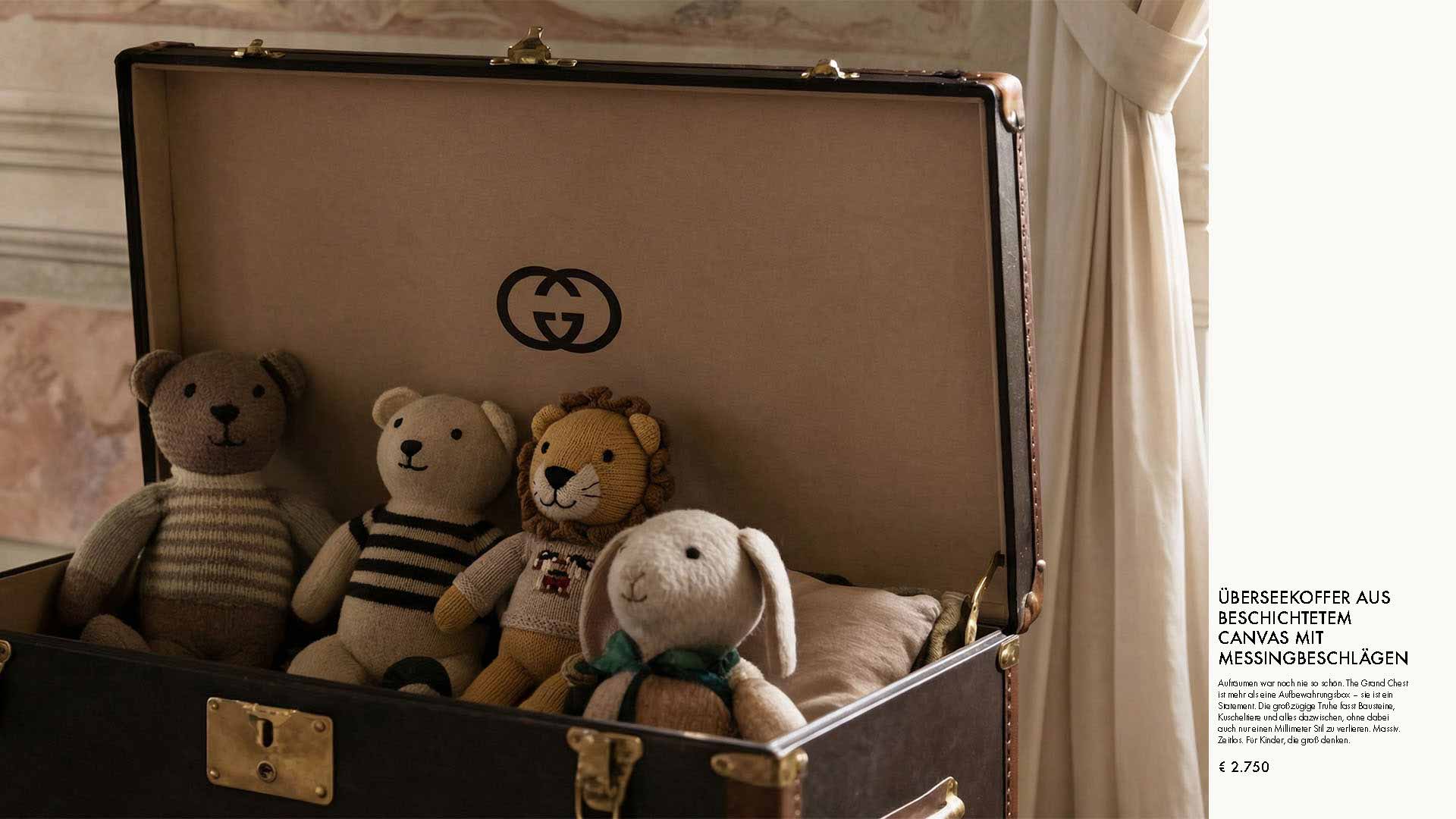 Open vintage suitcase with four stuffed bears inside