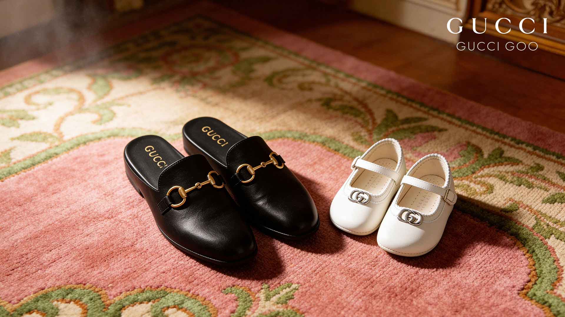 Black Gucci loafers with gold horsebit beside white Gucci flats on a pink patterned rug.